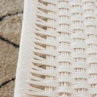 Banc marocain en bois brut et tressage coton