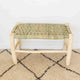 Banc berbère traditionnel en bois brut et tressage naturel