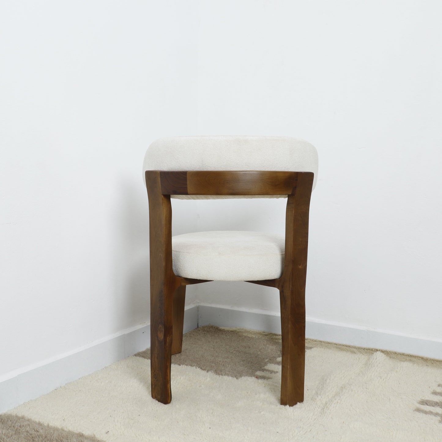 Minimalist Wooden Chair with soft white upholstery