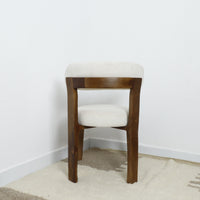 Minimalist Wooden Chair with soft white upholstery