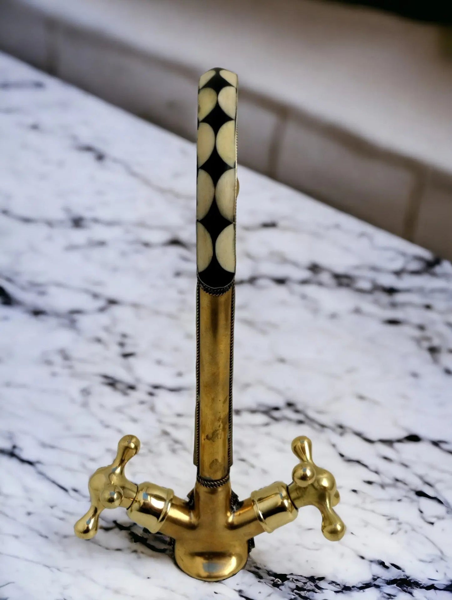 Unlacquered brass bathroom faucet with resin and bone accents #07
