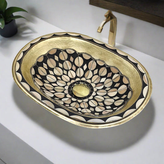 Side angle of Moroccan brass washbasin showing the depth and detailed pattern work, perfect for luxury bathroom decor